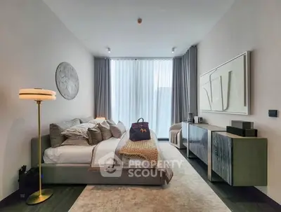 Luxurious modern bedroom with stylish decor and natural light