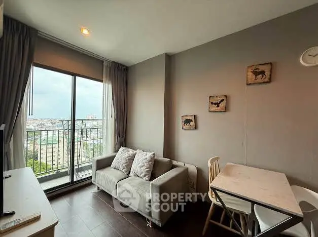 Charming living room with balcony view in modern apartment
