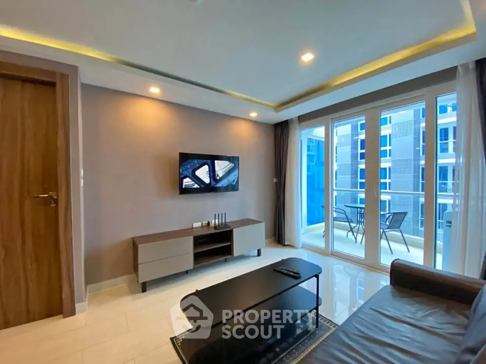 Modern living room with balcony view in contemporary apartment