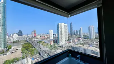 Stunning city view from modern bathroom with large corner window