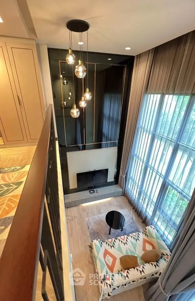 Stunning modern living room with high ceilings and elegant lighting, featuring a cozy seating area and large windows.