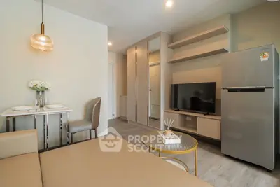 Modern living room with sleek furniture and stylish decor in a contemporary apartment.