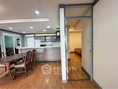 Spacious open-plan living area with modern kitchen and dining space