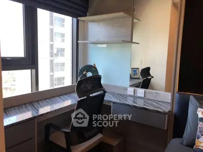 Modern study nook with marble desk and ergonomic chair in high-rise apartment