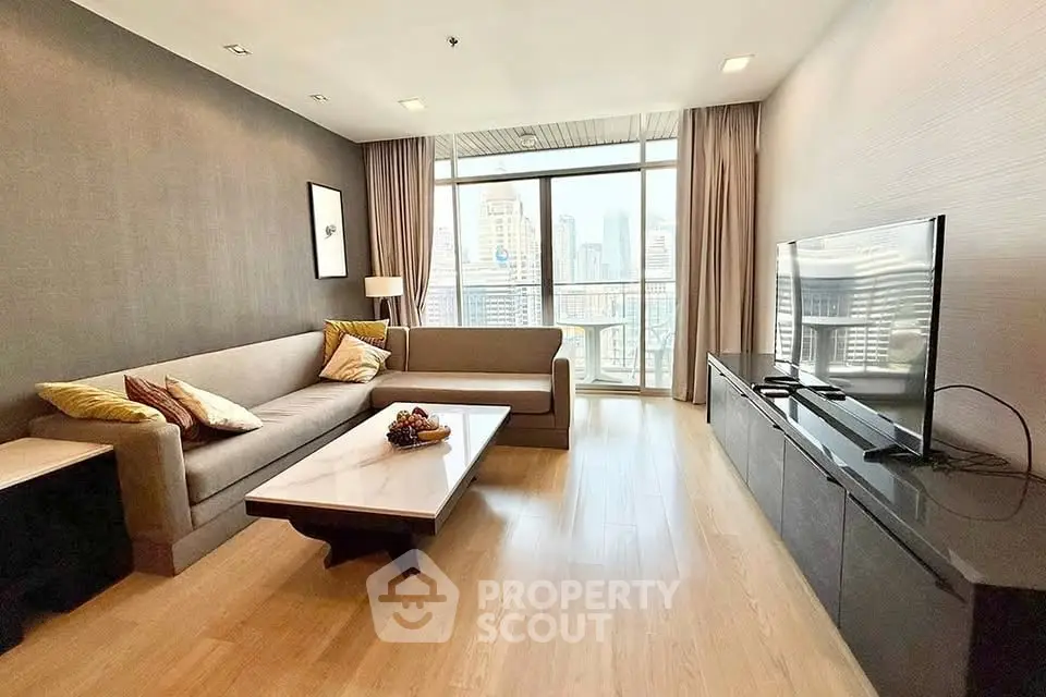 Spacious modern living room with city view and elegant decor