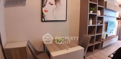 Modern living room with stylish decor and elegant shelving unit.