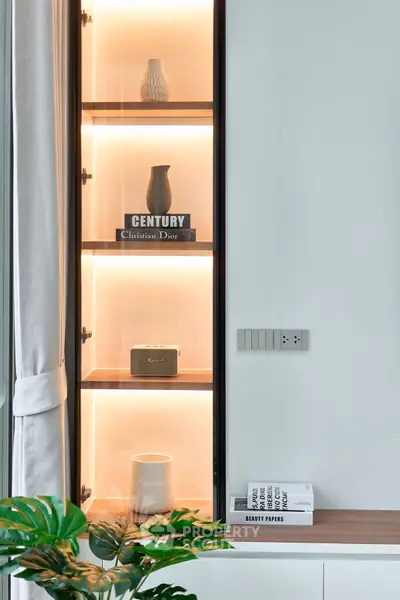 Modern interior with stylish shelving and decor in a contemporary living space.