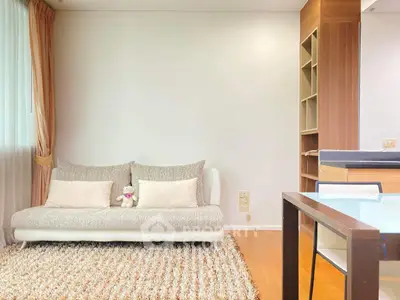 Modern living room with cozy sofa and stylish decor in a bright apartment