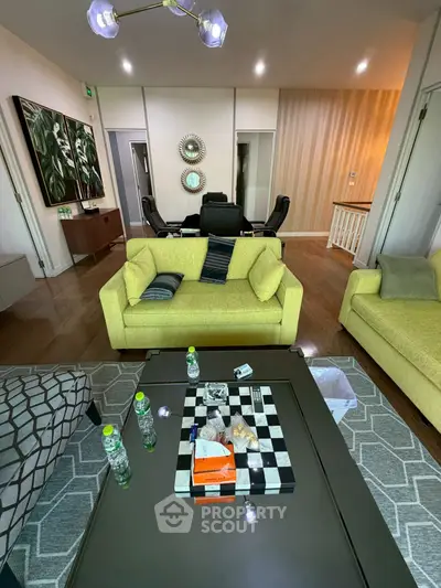 Spacious living room with modern decor and stylish furniture