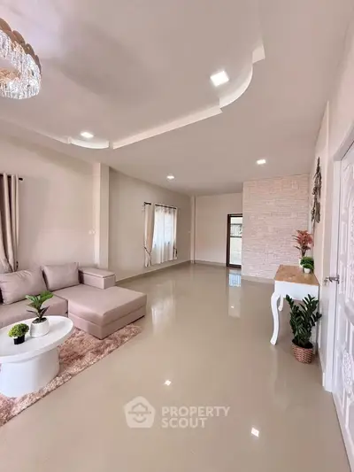 Spacious modern living room with elegant decor and natural light