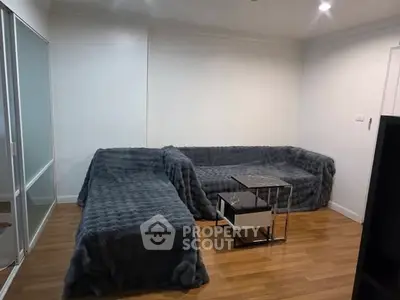 Cozy living room with modern furniture and wooden flooring