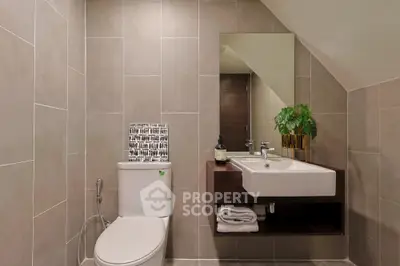 Modern bathroom with sleek fixtures and elegant tile design