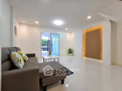 Spacious modern living room with sleek design and natural light