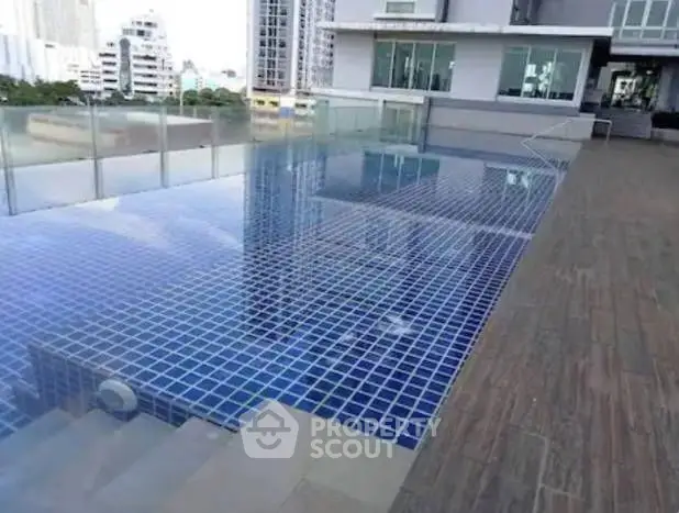 Luxurious rooftop pool with city views and modern design