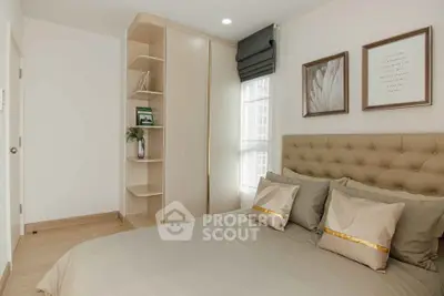 Modern bedroom with stylish decor and natural light