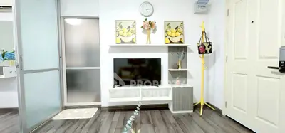 Modern living room with stylish decor and sleek flooring