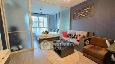 Modern studio apartment with stylish decor and cozy living area