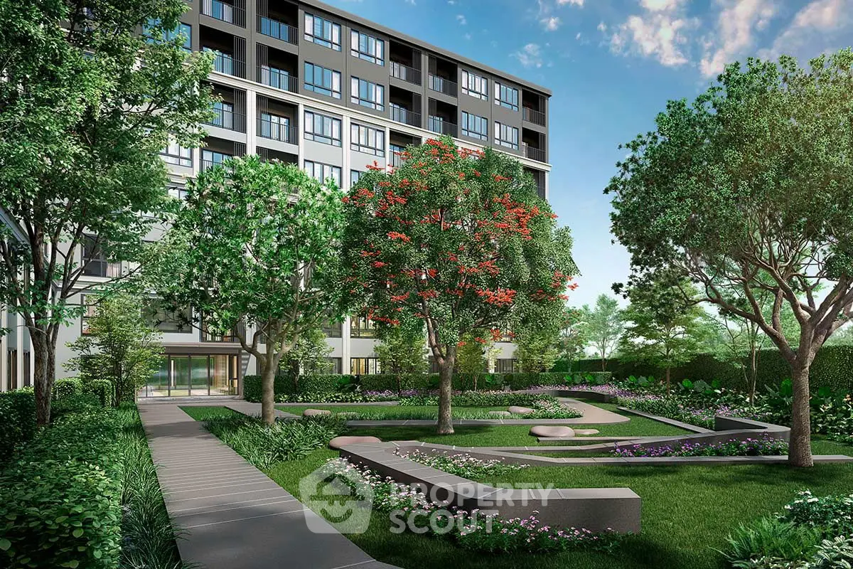 Luxurious garden view of modern apartment building with lush greenery and vibrant landscaping.