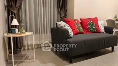 Cozy living room with festive decor and modern furniture