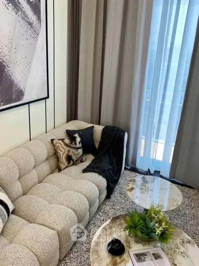 Stylish modern living room with plush sofa and elegant decor