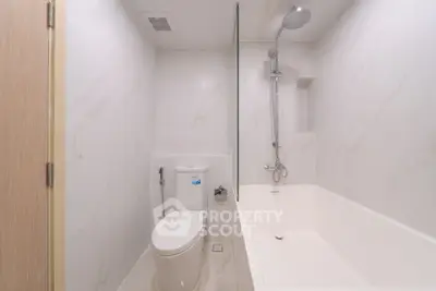 Modern bathroom with sleek design and bathtub in luxury apartment