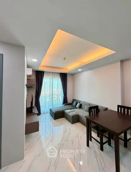 Modern living room with stylish lighting and elegant marble flooring