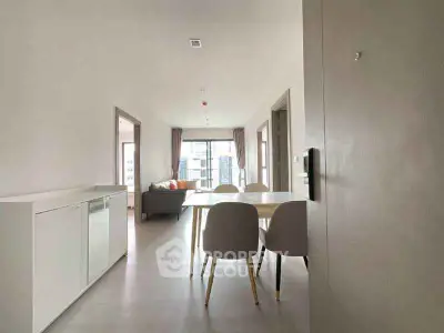 Spacious modern apartment with open dining area and city view