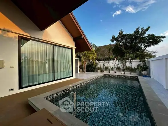 Stunning modern home with private pool and spacious patio, perfect for relaxation and entertaining.