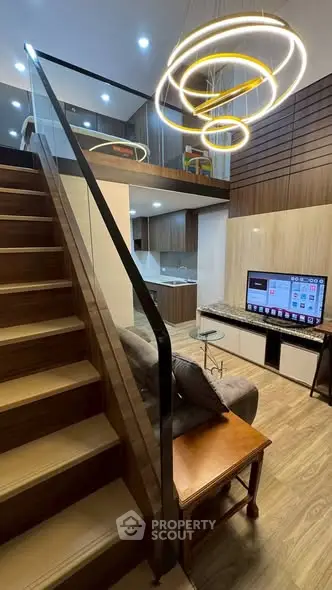 Modern loft apartment with stylish living area and open kitchen layout