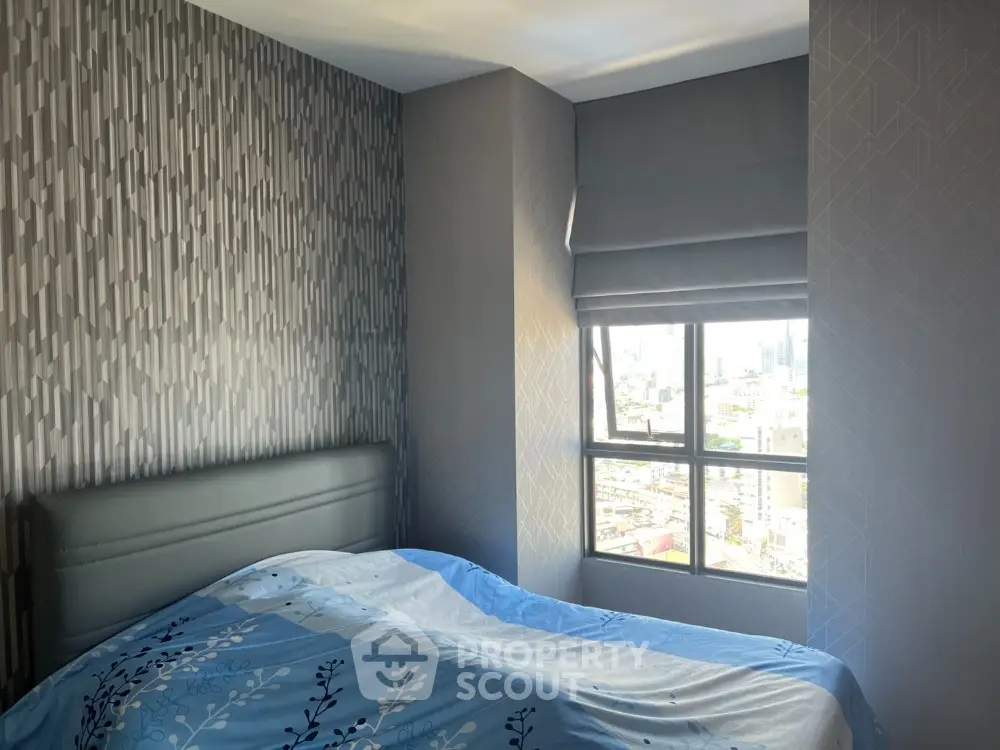Cozy bedroom with city view and modern wallpaper design