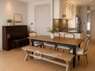 Charming dining area with elegant wooden table, piano, and modern kitchen in open layout apartment.