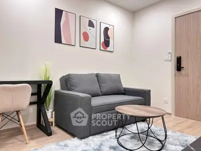 Modern living room with stylish decor and cozy seating area.