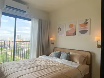 Cozy bedroom with large window and scenic city view, featuring modern decor and elegant lighting.