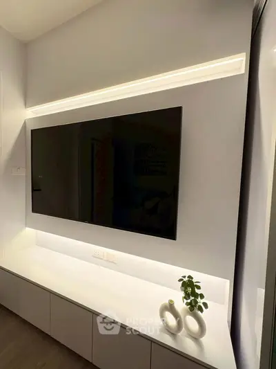 Modern living room with sleek TV setup and minimalist decor