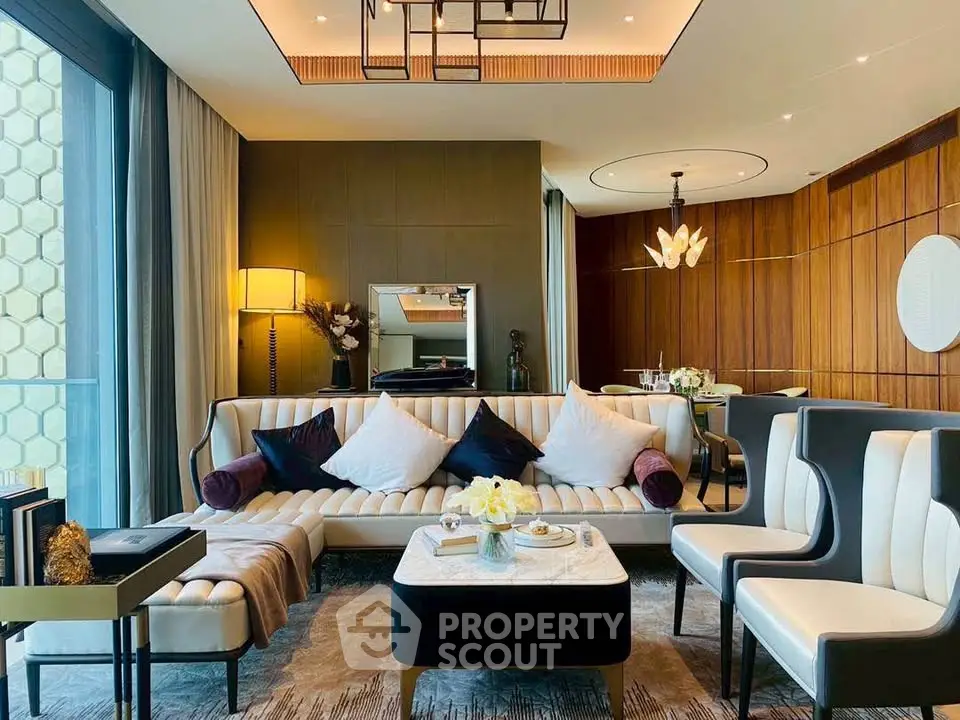Luxurious modern living room with elegant decor and stylish furniture in a high-end apartment.