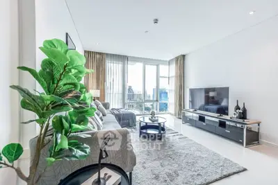 Spacious modern living room with city view and elegant decor