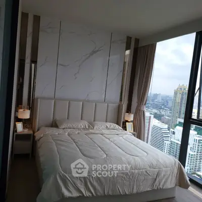 Luxurious bedroom with stunning city view in high-rise apartment