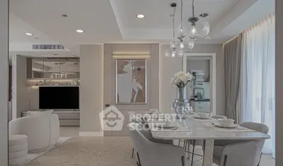 Luxurious modern living room and dining area with elegant decor and natural light.