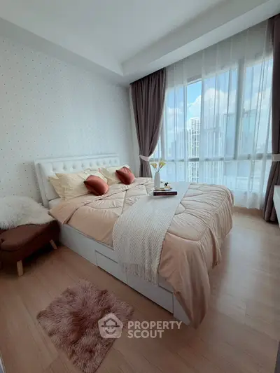 Cozy bedroom with large windows and stylish decor in modern apartment