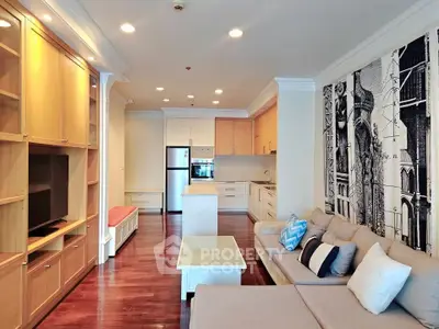 Spacious living room with modern kitchen and stylish decor