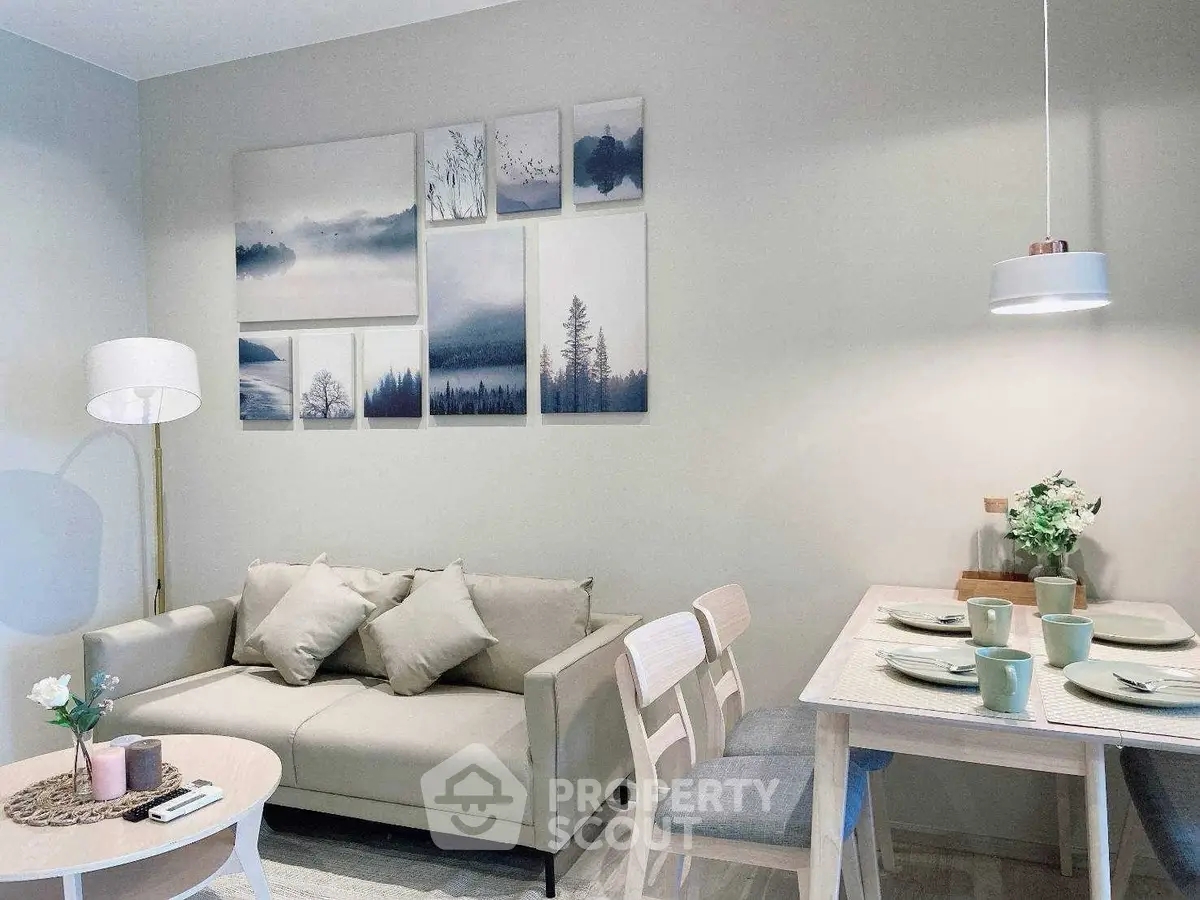Chic modern living room with cozy sofa and elegant dining area, perfect for urban living.