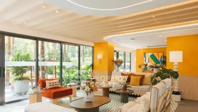 Luxurious modern living room with vibrant decor and garden view
