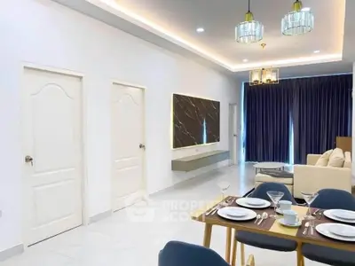 Modern living room with elegant dining setup and stylish lighting fixtures.