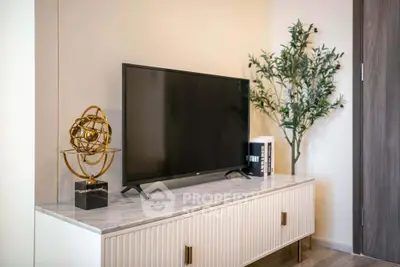 Modern living room with stylish TV stand and decorative elements