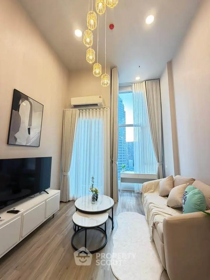 Luxurious high-ceiling living room with modern decor and city view.