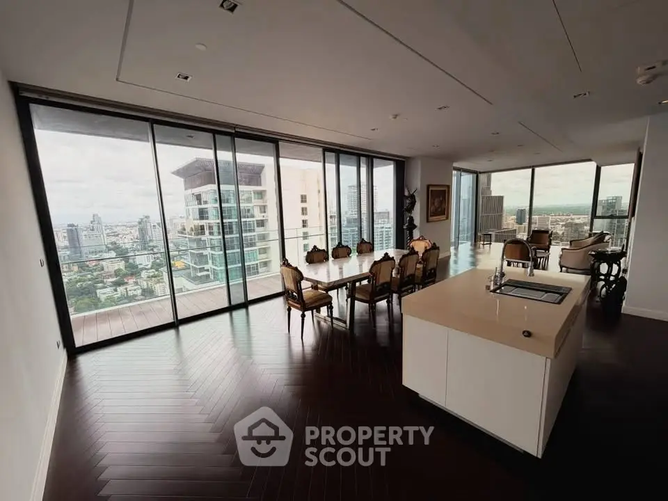 Luxurious open-plan living room with panoramic city views and elegant dining area.