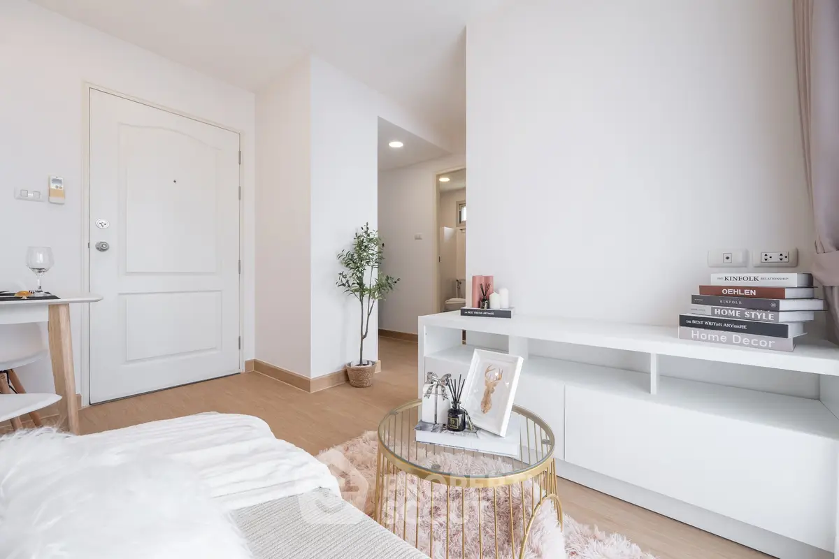 Cozy living room with modern decor and soft lighting, perfect for relaxation.