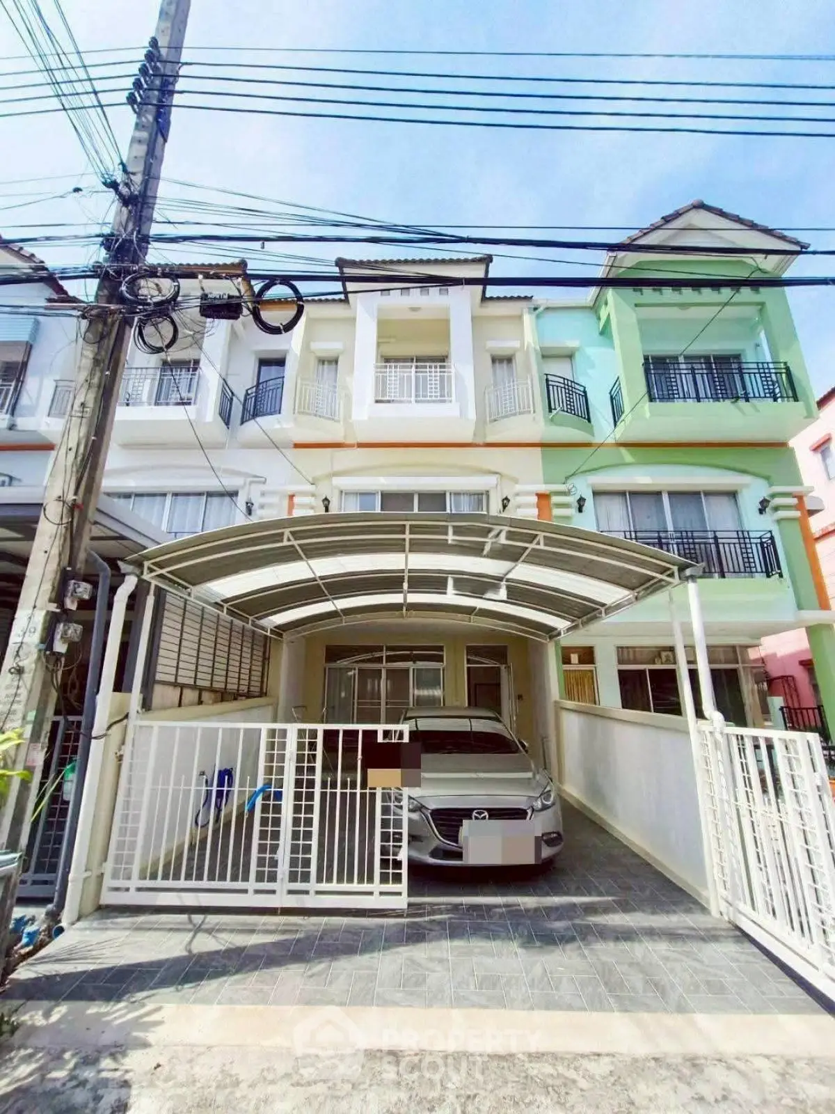 Charming townhouse with covered parking in vibrant neighborhood