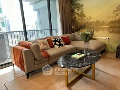 Stylish living room with modern sofa and scenic wall mural, perfect for urban living.