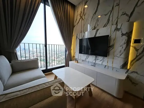 Luxurious living room with marble accent wall and panoramic city view.
